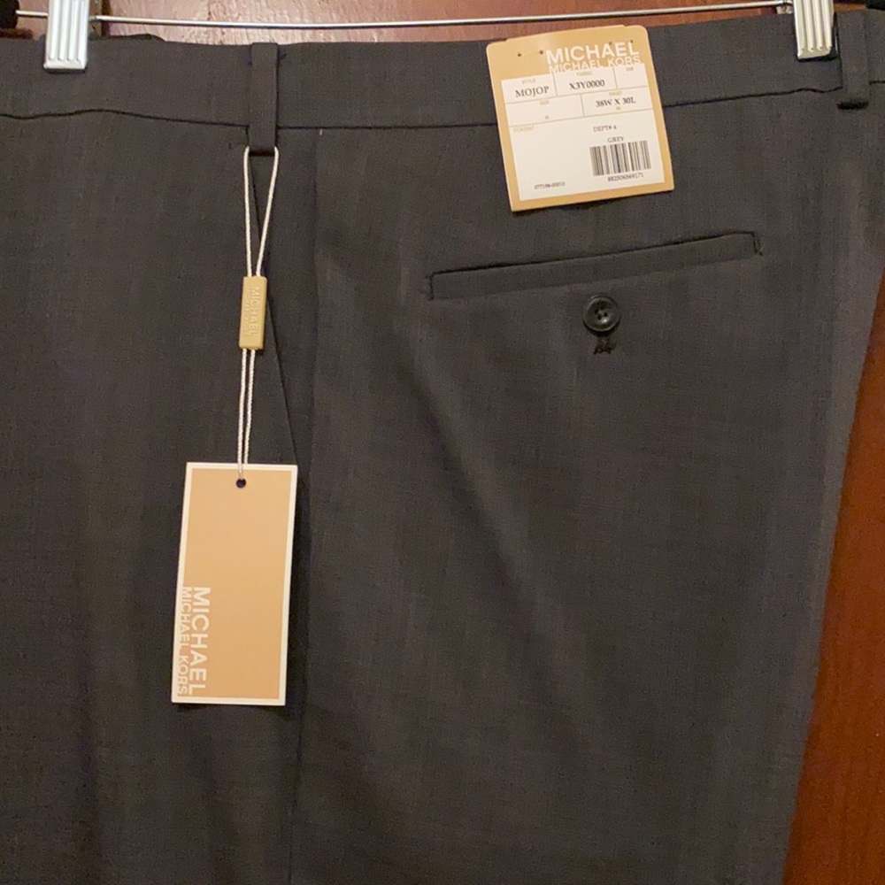 Never worn, tags still on, Michael Kors men’s grey dress pants.